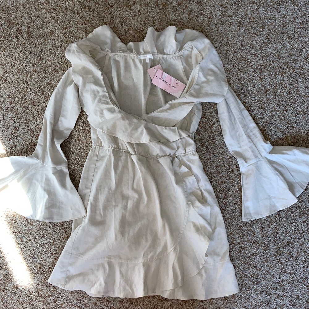 Lola Shoutique nude dress with ruffle details